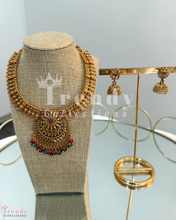 Antique Gold Circular Pendant Temple Necklace with Ruby Stones and Jhumka Earring Set